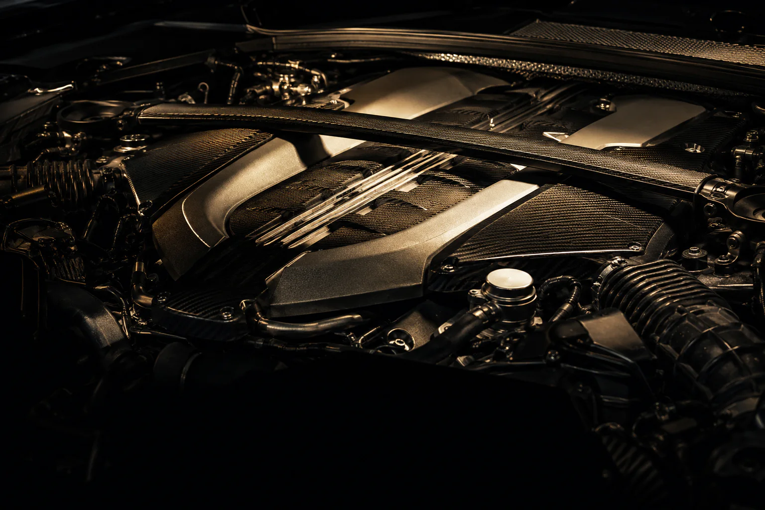 A specialist inspecting a pre-owned performance car in a refined workshop